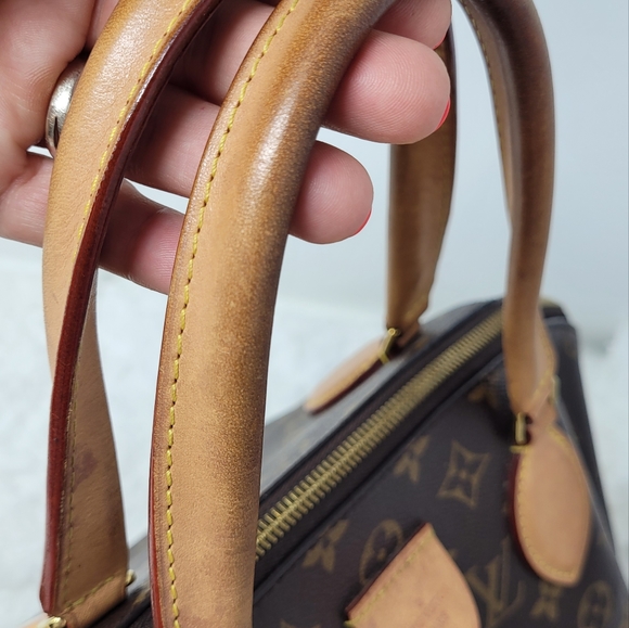 LOUIS VUITTON RIVOLI PM - Picture 8 of 15